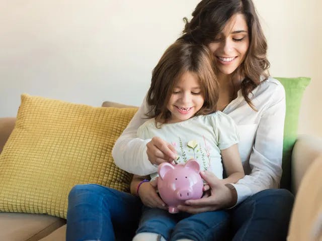 mom-and-daughter-saving-money